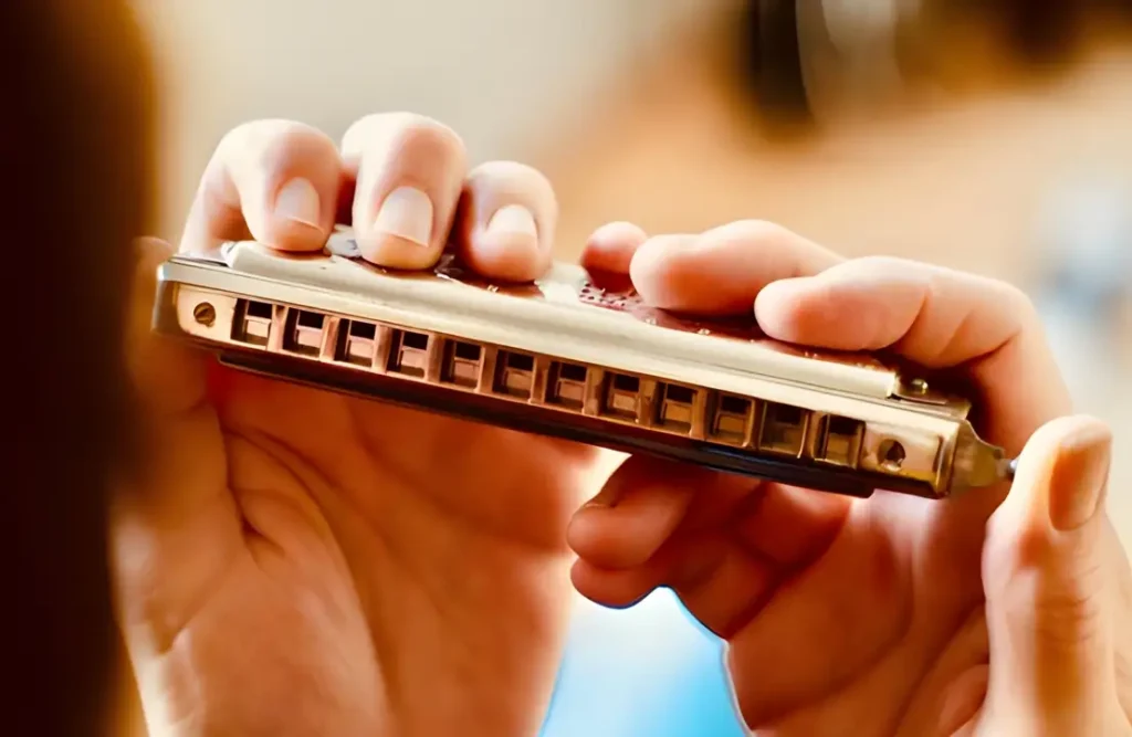 How you hold your harmonica significantly impacts your tone quality and playing comfort