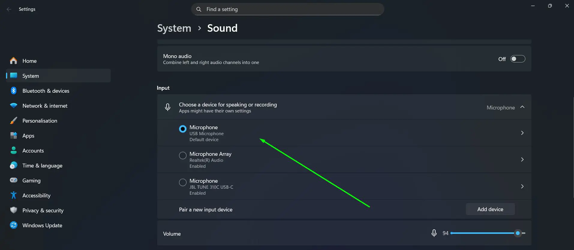 Click on the microphone you want to switch to. Windows applies the change immediately as the new default input