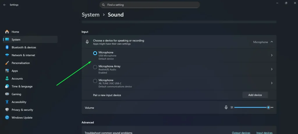 Select the preferred microphone or audio input – such as a USB headset mic, a built-in microphone, or an external interface