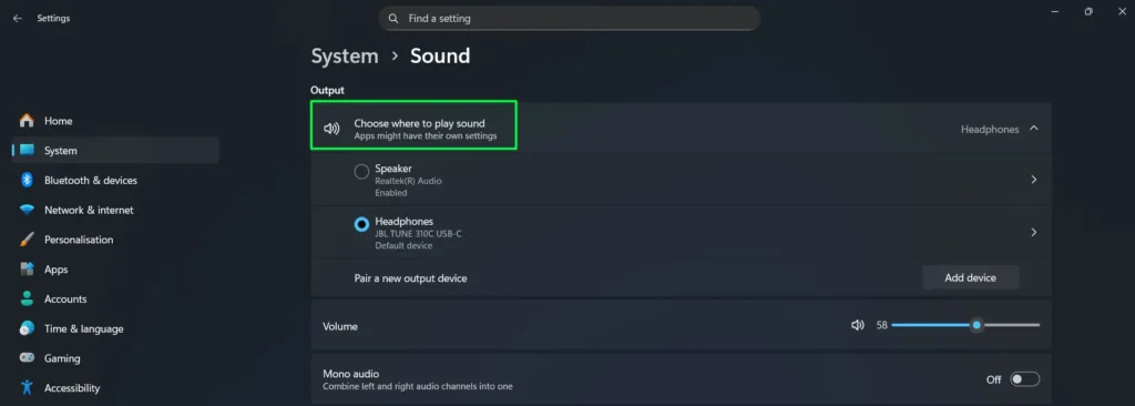 Under the ‘Output’ section, find the dropdown labeled ‘Choose where to play sound’