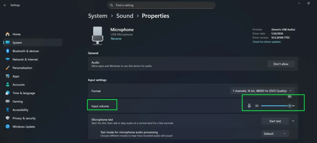 Use the Input volume slider to adjust your microphone's sensitivity level
