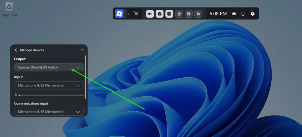 Click the Output dropdown and select the playback device you want to use as the new default