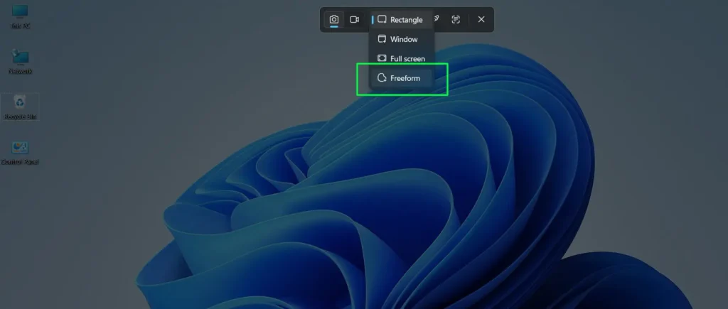 Click the third icon ‘Snipping Area’ and select ‘Freeform’