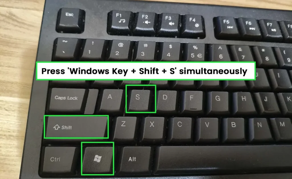 Press Windows + Shift + S on the keyboard simultaneously