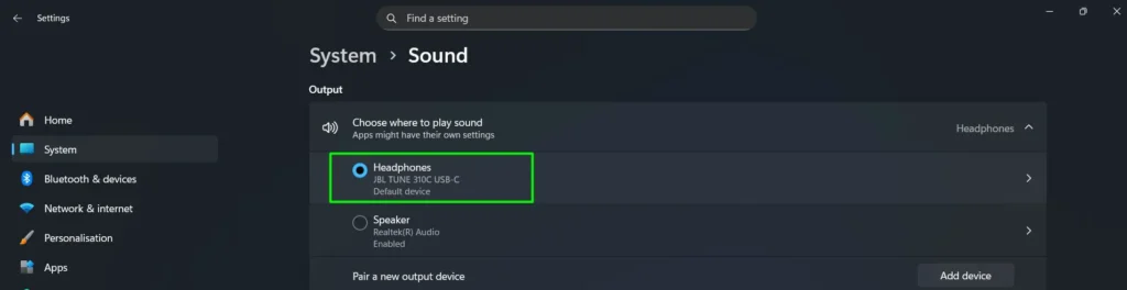 Under Output, click on your active audio device (such as Speakers or Headphones)